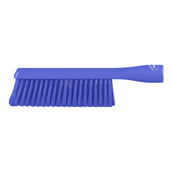 A blue brush with a long handle and dense bristles, shown against a white background.