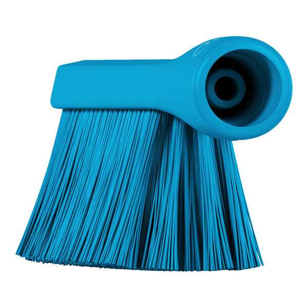 A blue brush head with a threaded handle opening and densely packed bristles.