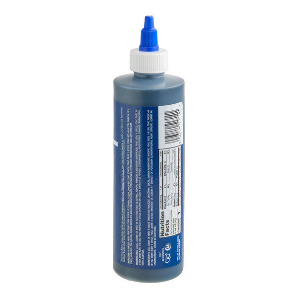 A plastic squeeze bottle with a blue liquid inside, featuring a white cap and blue nozzle, and labeled with nutritional information and a barcode.
