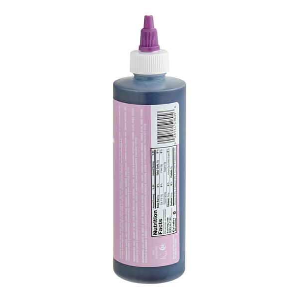 A plastic squeeze bottle with a purple cap and a nutrition facts label, containing a dark liquid.