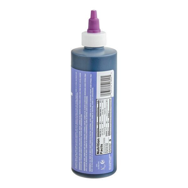 A plastic squeeze bottle with a purple twist cap, featuring a nutrition facts label and barcode on the side.