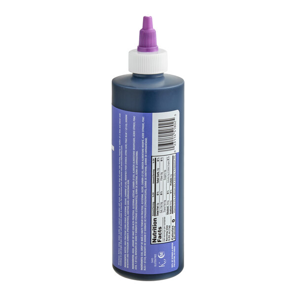 A plastic squeeze bottle with a purple label, white cap, and purple nozzle, displaying nutrition facts and a barcode.