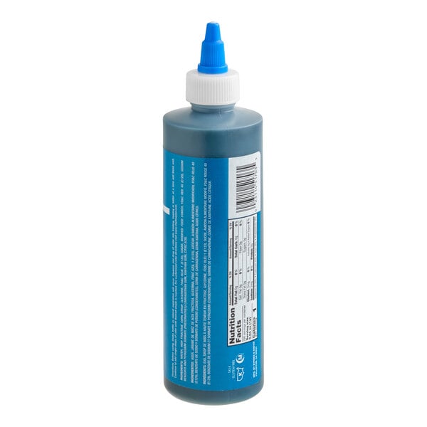 A plastic squeeze bottle with a blue label, white cap, and blue nozzle, containing a dark blue liquid.