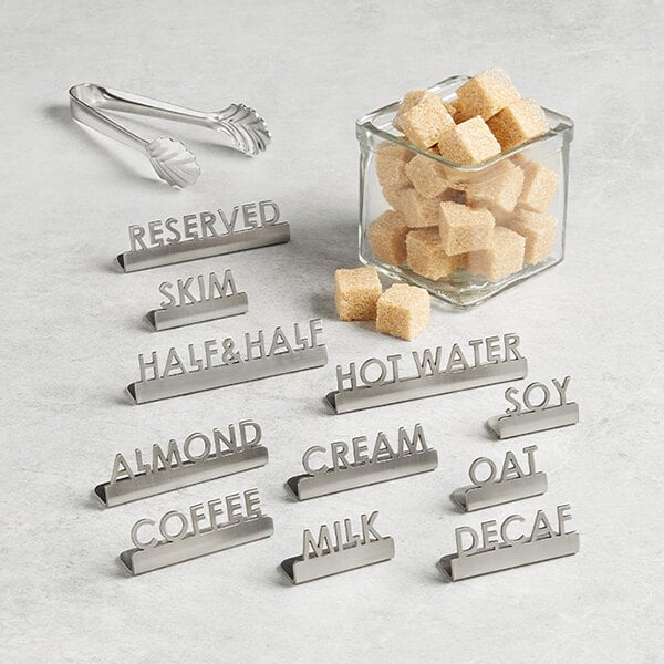 American Metalcraft 2 1/2" x 5/8" x 3/4" Stainless Steel Mini Laser-Cut Tabletop Sign with "Almond" Print - 12/Case