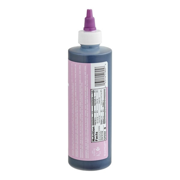 A plastic squeeze bottle with a purple cap and a nutrition facts label, containing a dark liquid.