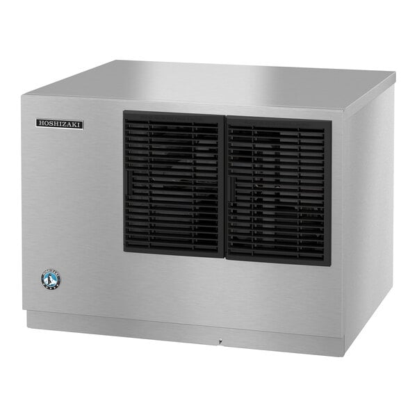 A stainless steel rectangular appliance with two black vented panels on the front and a small logo in the lower left corner.