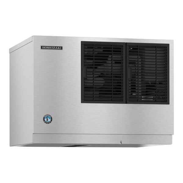 A rectangular stainless steel appliance with two black vented panels on the front and a small logo in the lower left corner.
