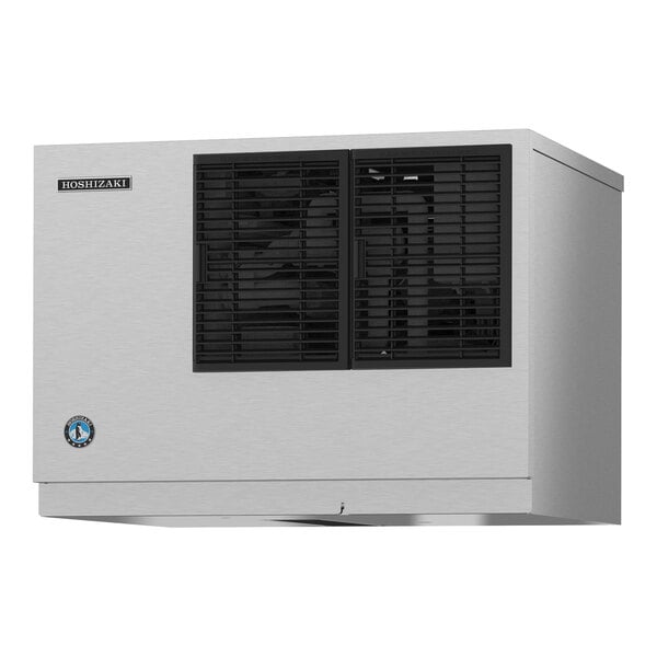 A rectangular stainless steel appliance with two black vented panels on the front and a small logo in the lower left corner.