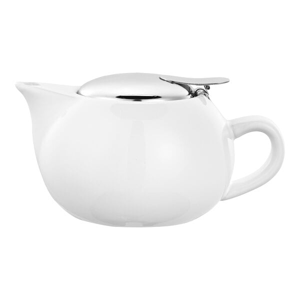 A round white ceramic teapot with a curved handle and a shiny metal lid.