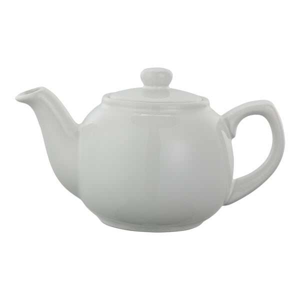 A white ceramic teapot with a rounded body, curved spout, and a handle, featuring a fitted lid with a knob on top.