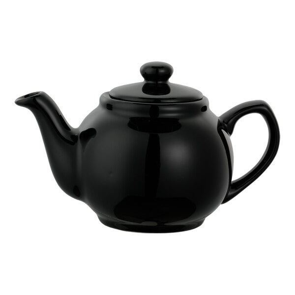 A glossy black ceramic teapot with a rounded body, curved spout, and a handle, featuring a matching lid with a knob.