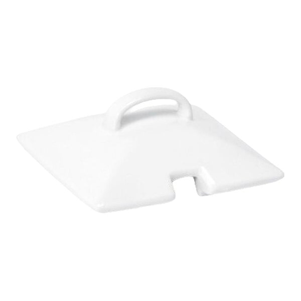A white, square-shaped porcelain lid with a handle and a small notch on one side.