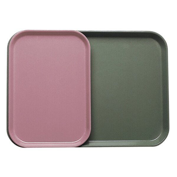 A green and pink rectangular Cambro tray insert.