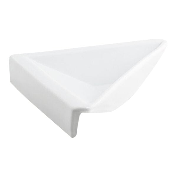 A white, shallow, triangular porcelain dish with a unique hanging edge design.