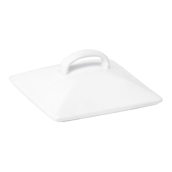 A white, square-shaped porcelain lid with a curved handle on top.