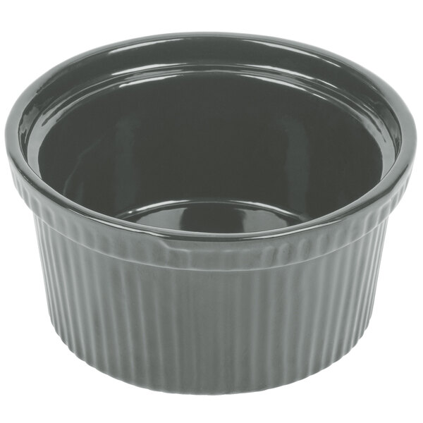 A gray Tablecraft cast aluminum souffle bowl with ridges.