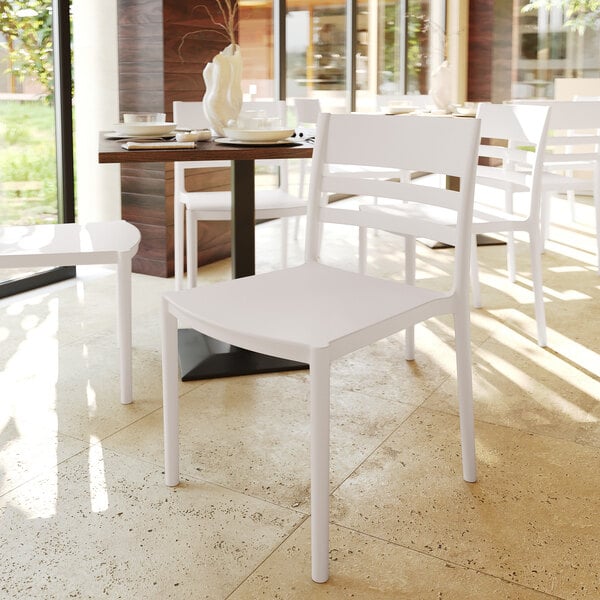Flash Furniture Bridgeport White Resin Indoor / Outdoor Stackable Slat Back Side Chair