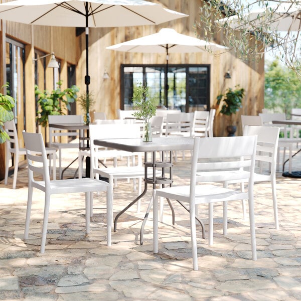 Flash Furniture Bridgeport White Resin Indoor / Outdoor Stackable Slat Back Side Chair