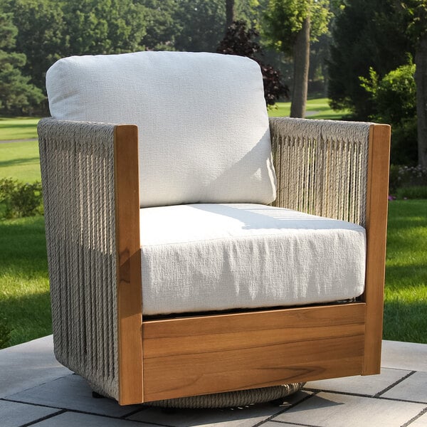 Outdoor Interiors Speckled Cable Wicker and Teak Swivel Chair with Acrylic Fabric Cushions