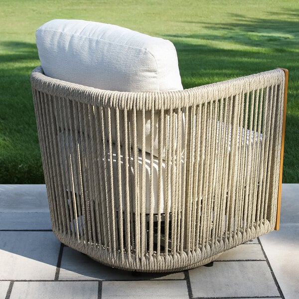 Outdoor Interiors Speckled Cable Wicker and Teak Swivel Chair with Acrylic Fabric Cushions