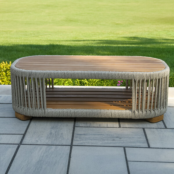 Outdoor Interiors 47" x 23 1/2" Speckled Cable Wicker and Teak Coffee Table