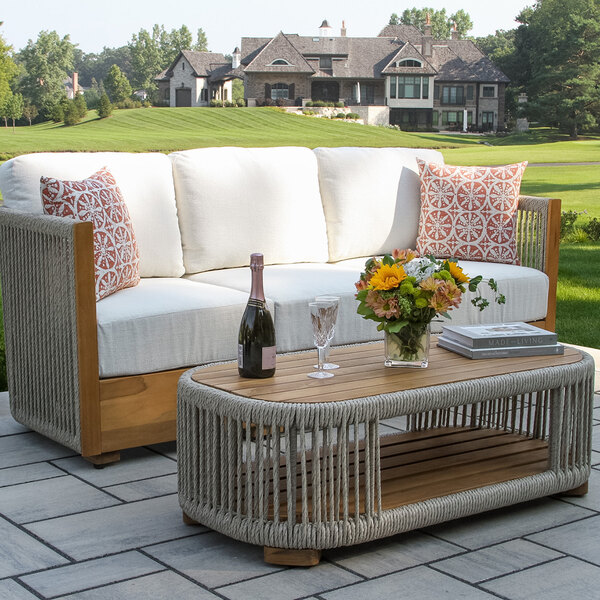 Outdoor Interiors 47" x 23 1/2" Speckled Cable Wicker and Teak Coffee Table