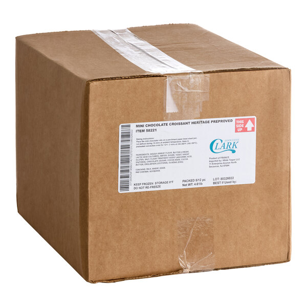 A sealed brown cardboard box with a white product label and clear tape on top.