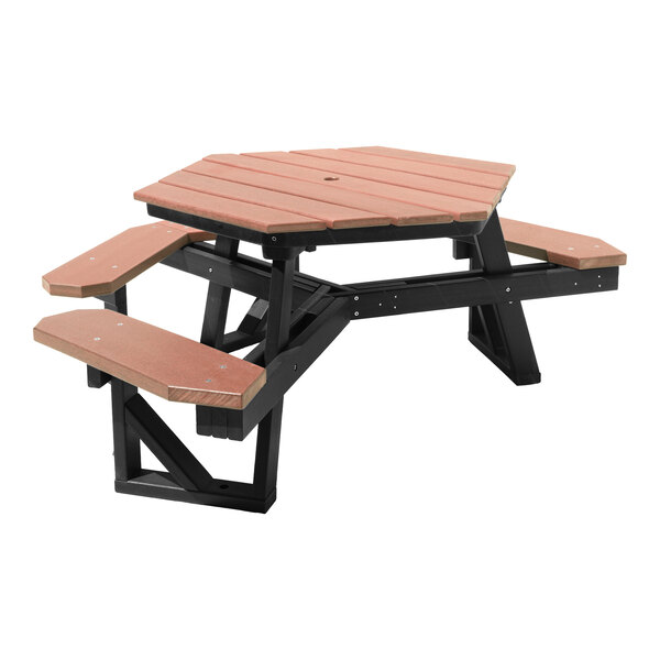 A hexagonal picnic table with attached benches, featuring a brown slatted top and seats with a black frame.