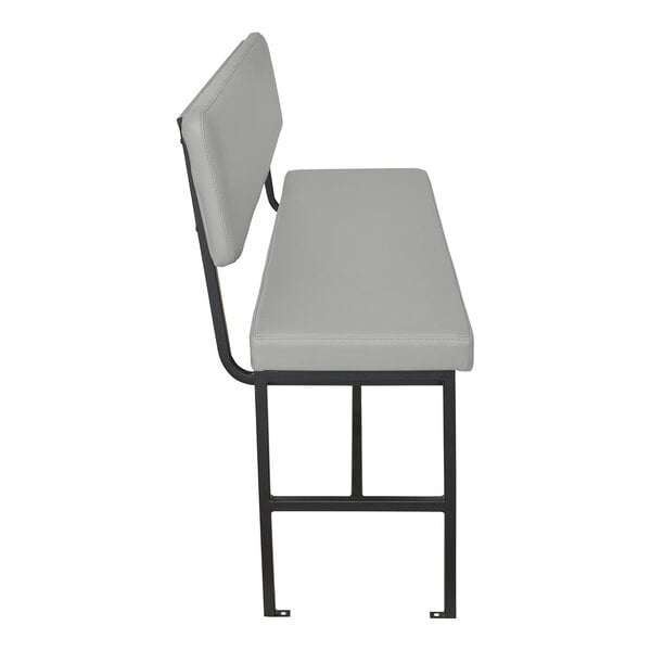 A side view of a bench with a gray upholstered seat and backrest, supported by a black metal frame.