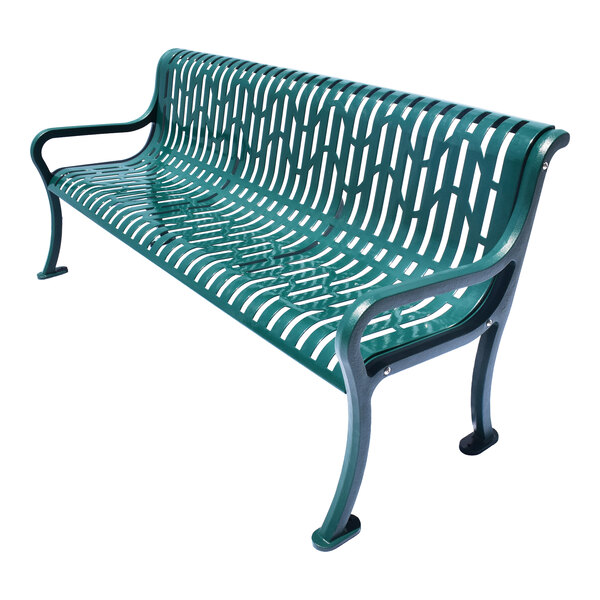 A green metal bench with a wavy, openwork pattern and armrests on both sides.