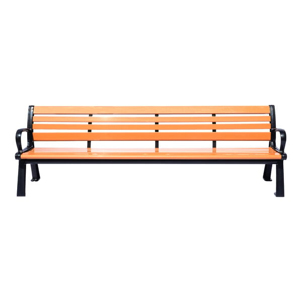 A full view of a long bench with orange slats and black metal legs and armrests.