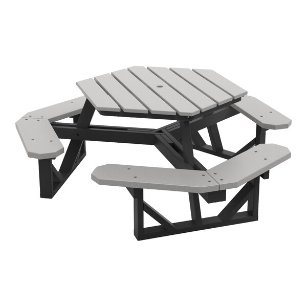 A hexagonal picnic table with attached benches, featuring a gray slatted top and seats with a black frame.