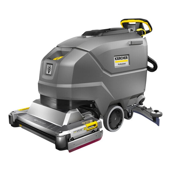 A large, gray, industrial floor scrubber with wheels, a handle, and visible brand labeling on the side.