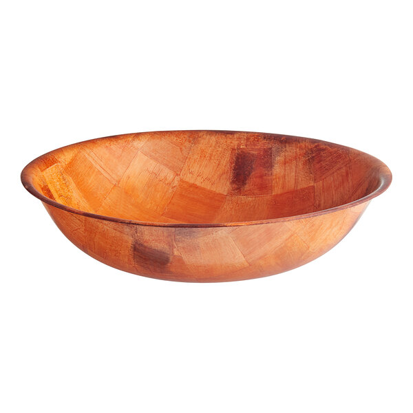 A round, shallow wooden bowl with a patchwork pattern, shown against a white background.