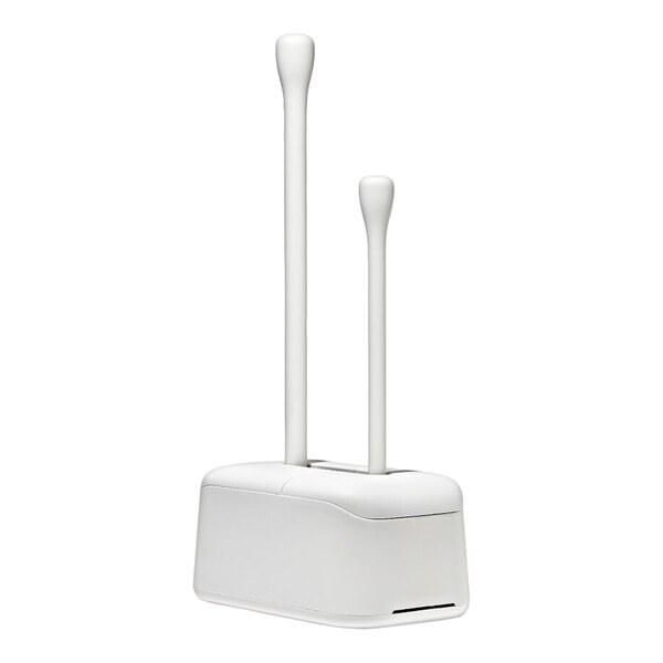 A white caddy holding a toilet bowl brush and a plunger, both with long handles and rounded tops.