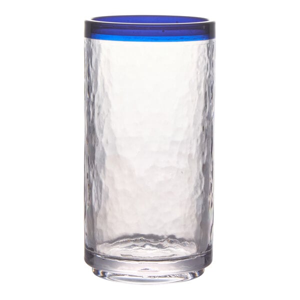 A clear, textured plastic tumbler with a blue rim at the top.