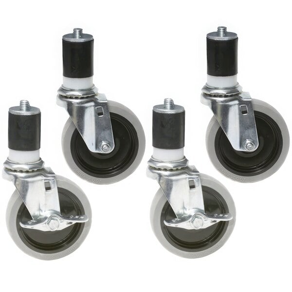 A group of Eagle Group zinc swivel stem casters with rubber wheels.