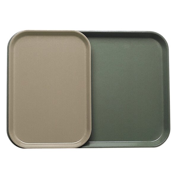 A rectangular desert tan Cambro tray with a lid on a counter.