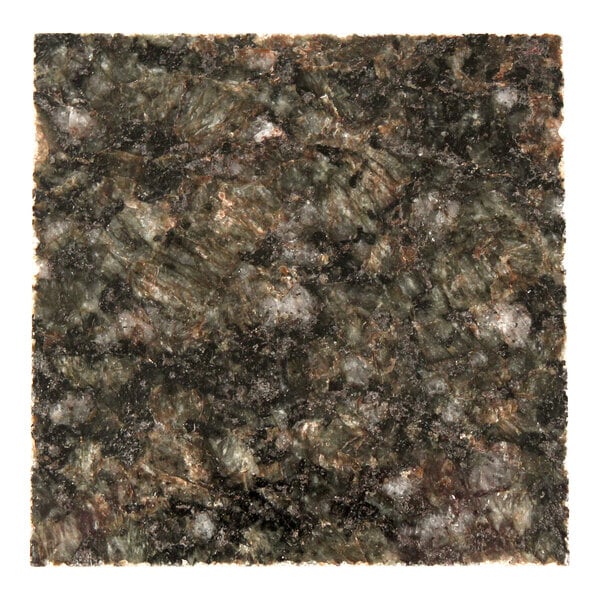A close-up view of a dark, speckled granite-like surface with shades of green, black, and brown.