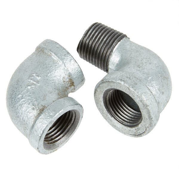 A close-up of a T&S gas connector hose with metal pipe fittings and nuts.