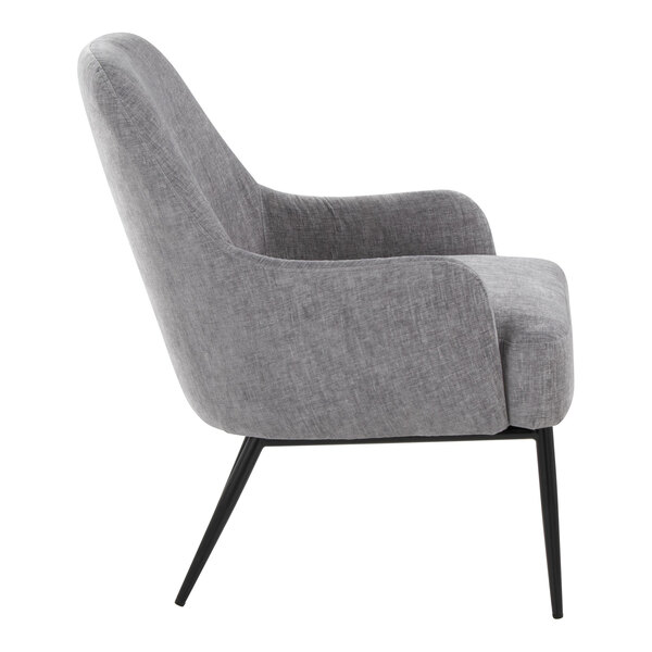 A side view of a modern chair with light grey fabric upholstery and black metal legs.