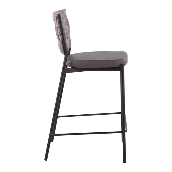 A side view of a counter-height stool with a black metal frame, a light brown braided fabric backrest, and a cushioned faux leather seat.