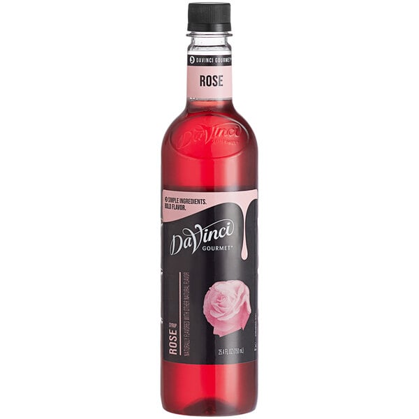 A clear bottle filled with red liquid, featuring a black label with a pink rose image and the text 'DaVinci Gourmet Rose'.