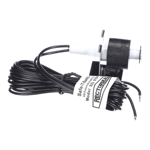 A small electronic switch device with a coiled black wire, a white threaded plastic component, and a label attached to the wire.