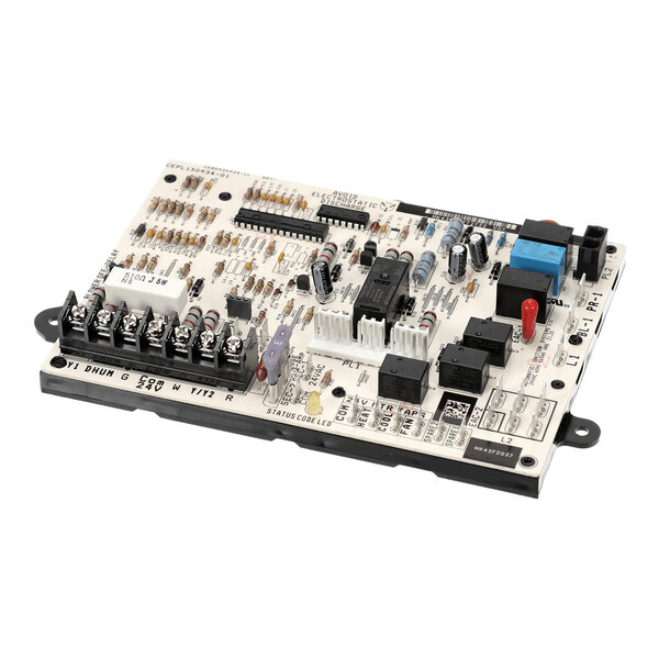 A rectangular electronic circuit board with various components such as resistors, capacitors, relays, connectors, and terminal blocks mounted on its surface.