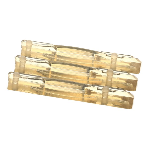 Three translucent, rectangular plastic pieces with cylindrical stoppers on one end, stacked together.