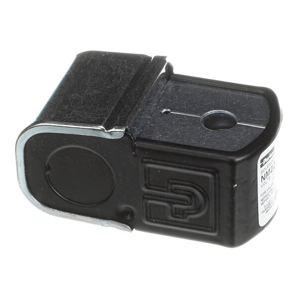 A small, rectangular black and metallic component with a circular hole on top and embossed markings on the side.