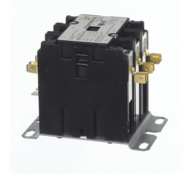 A black electrical contactor with three brass terminals on each side, mounted on a metal base with four mounting holes.