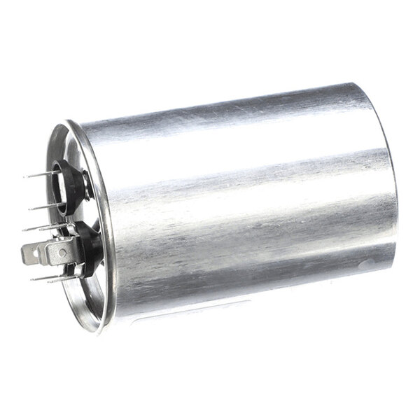 A cylindrical metallic component with several electrical terminals on one end, likely an electronic capacitor.