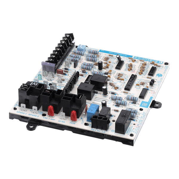 A rectangular electronic circuit board with various components including capacitors, resistors, relays, connectors, and integrated circuits mounted on its surface.
